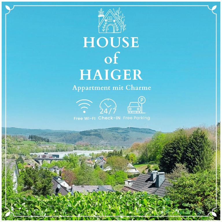 a book cover of a house of harrar with a picture of a village at House of Haiger Ferienwohnung mit Charme in Haiger