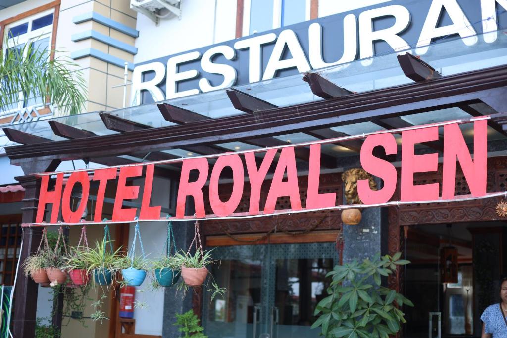 a hotel royal sign on the front of a building at Hotel Royal Sen in Lālbhitti