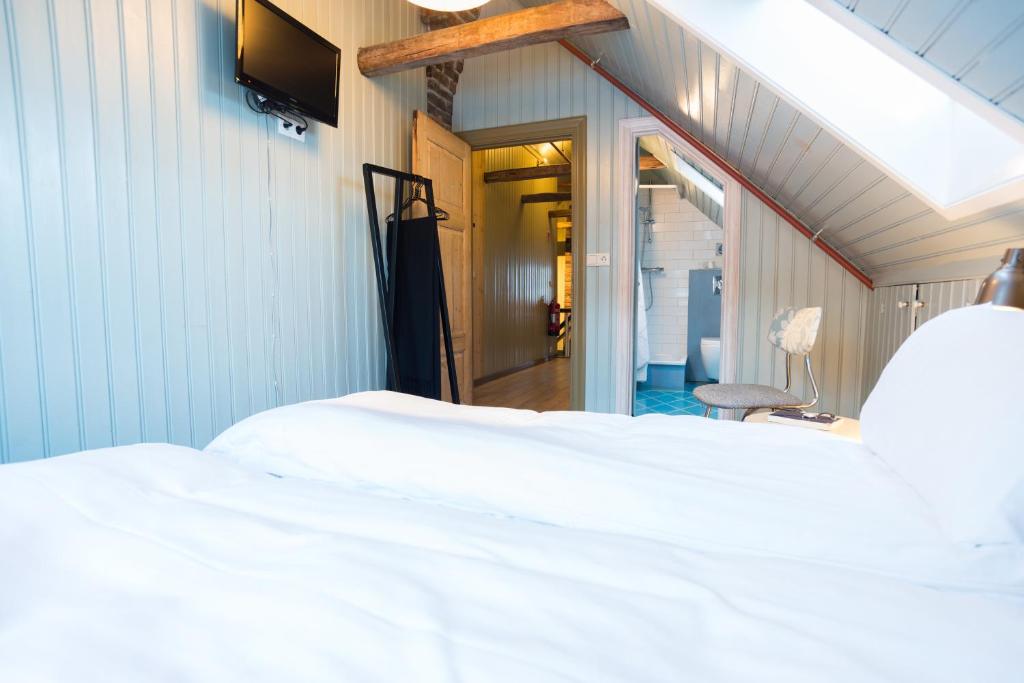 Postel nebo postele na pokoji v ubytování Reykjavík Treasure B&B