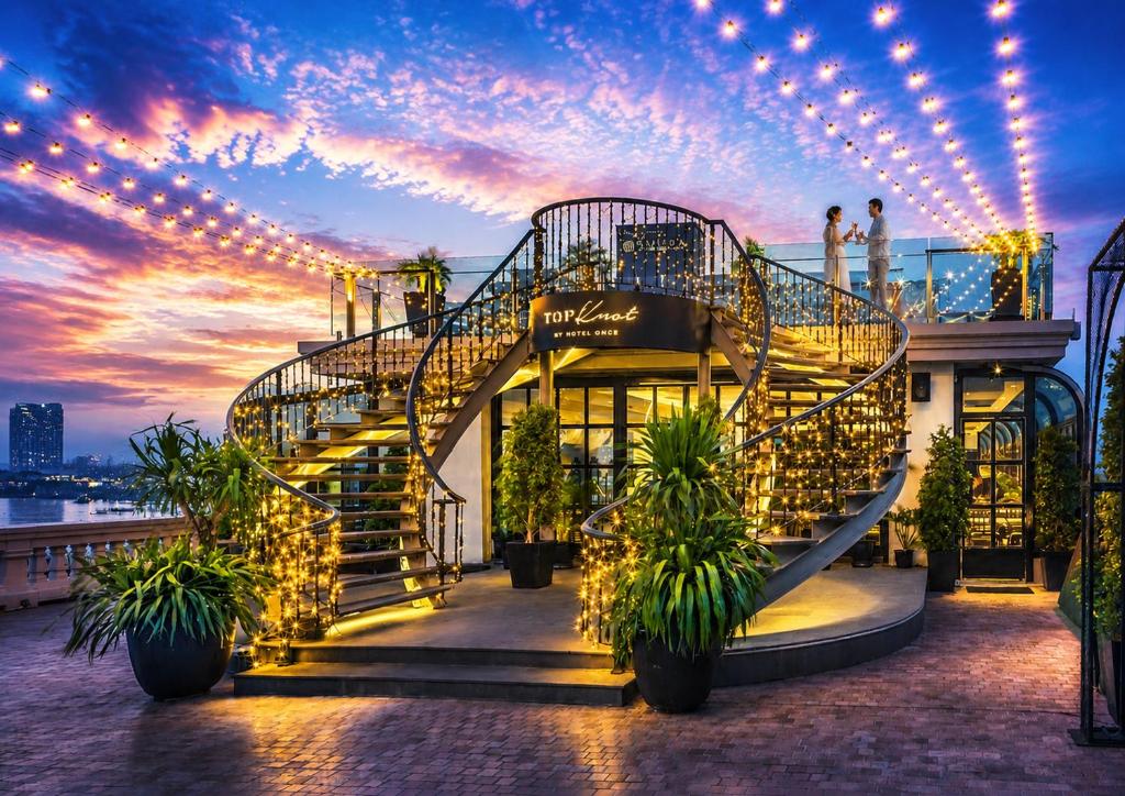 a staircase on top of a building with lights at Hotel Once Bangkok in Bangkok