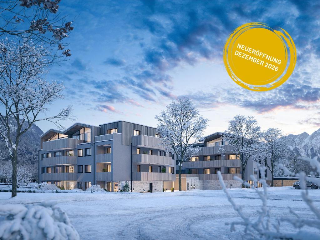 a rendering of a building in the snow with a frisbee at Wieshof Wilder Kaiser by ALPS RESORTS in Söll