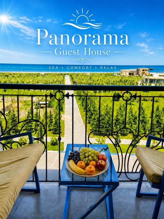 a tray of fruit on a table on a balcony at Panorama in Sumqayıt