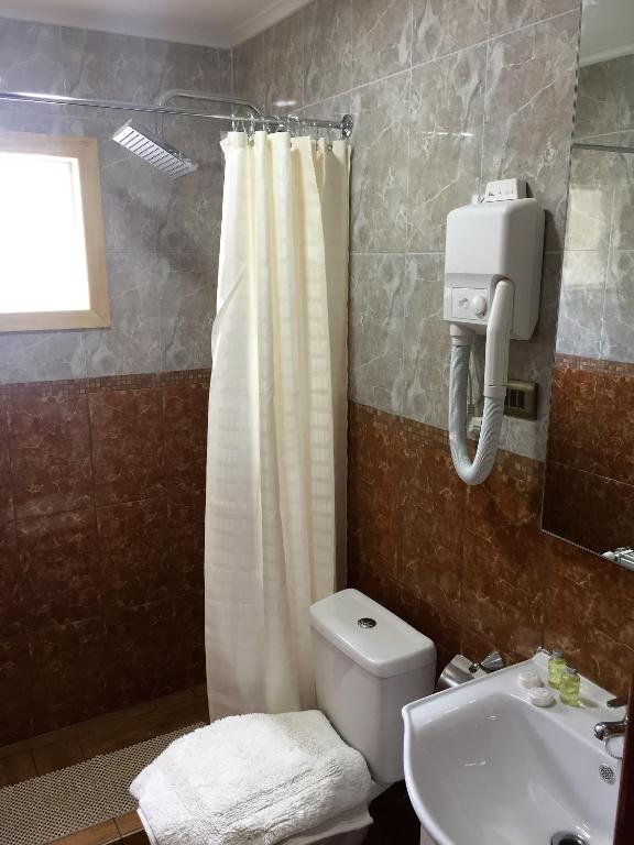Koupelna v ubytování Hostal Andes Patagonicos