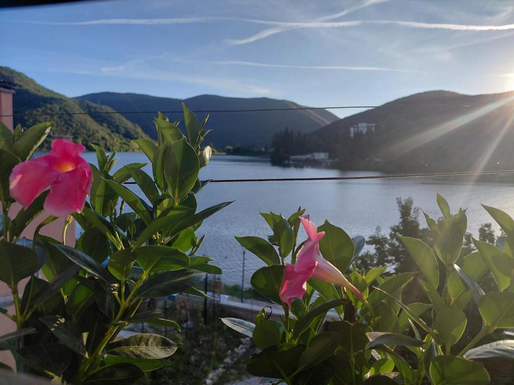 a view of a lake with mountains in the background at Casa Blu in Piediluco