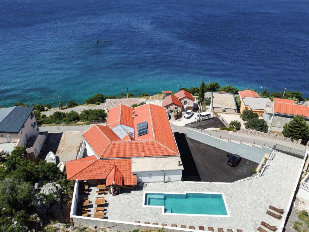 an aerial view of a house with orange roof at Apartment Delfin-2 by Interhome in Cesarica