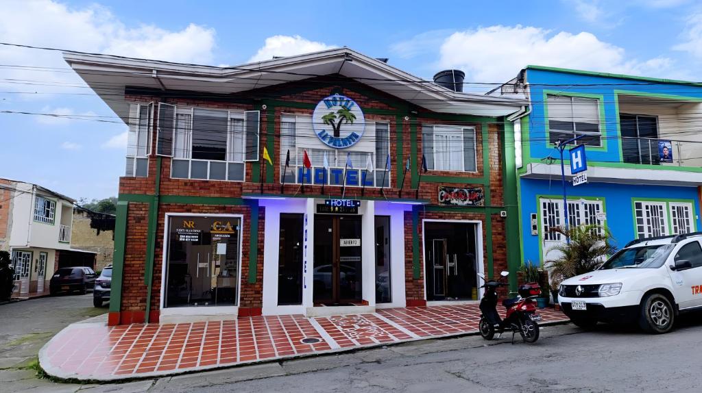 a building on the side of a street at Hotel La Palmita in Pacho