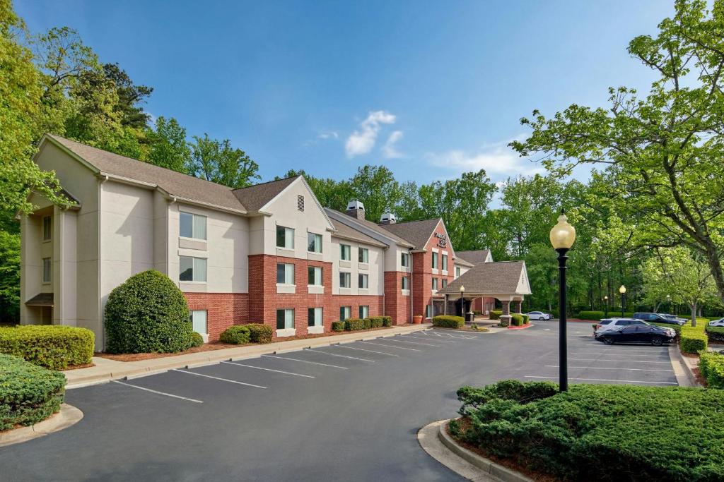 a parking lot in front of a building at SpringHill Suites by Marriott Atlanta Alpharetta in Alpharetta