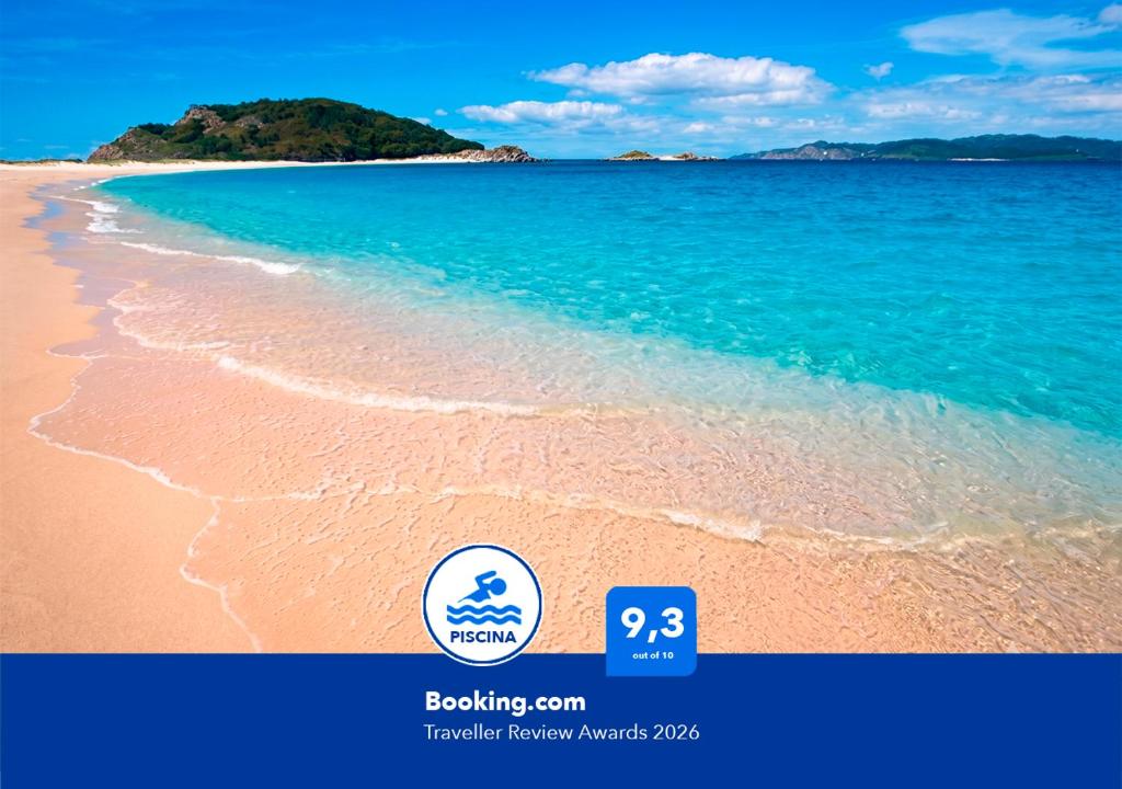 a picture of a beach with the ocean at Apartalux Playa Paraíso in La Manga del Mar Menor