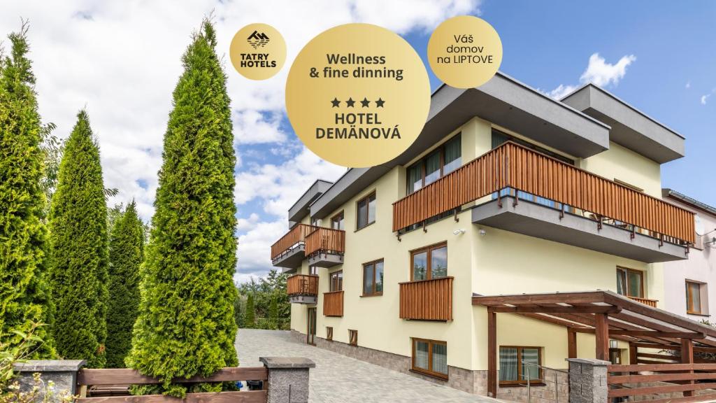 a building with the words wellness fire drinking hotel dharma at Hotel Demanova Apartments - Dependance in Liptovský Mikuláš
