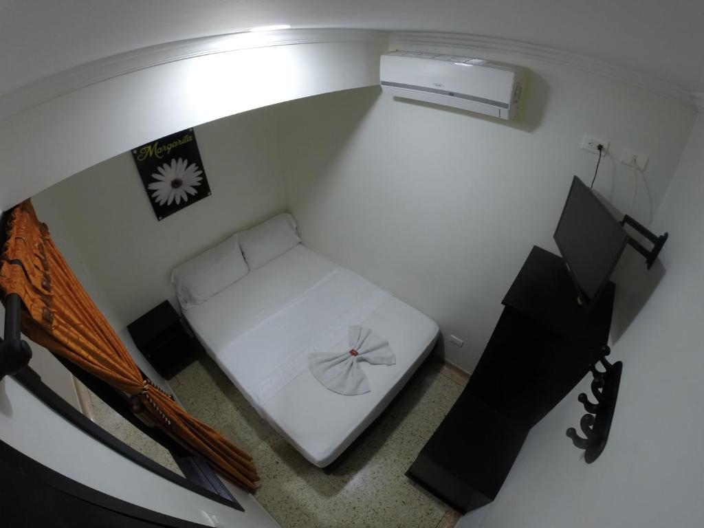 Postel nebo postele na pokoji v ubytování Casa Villavicencio
