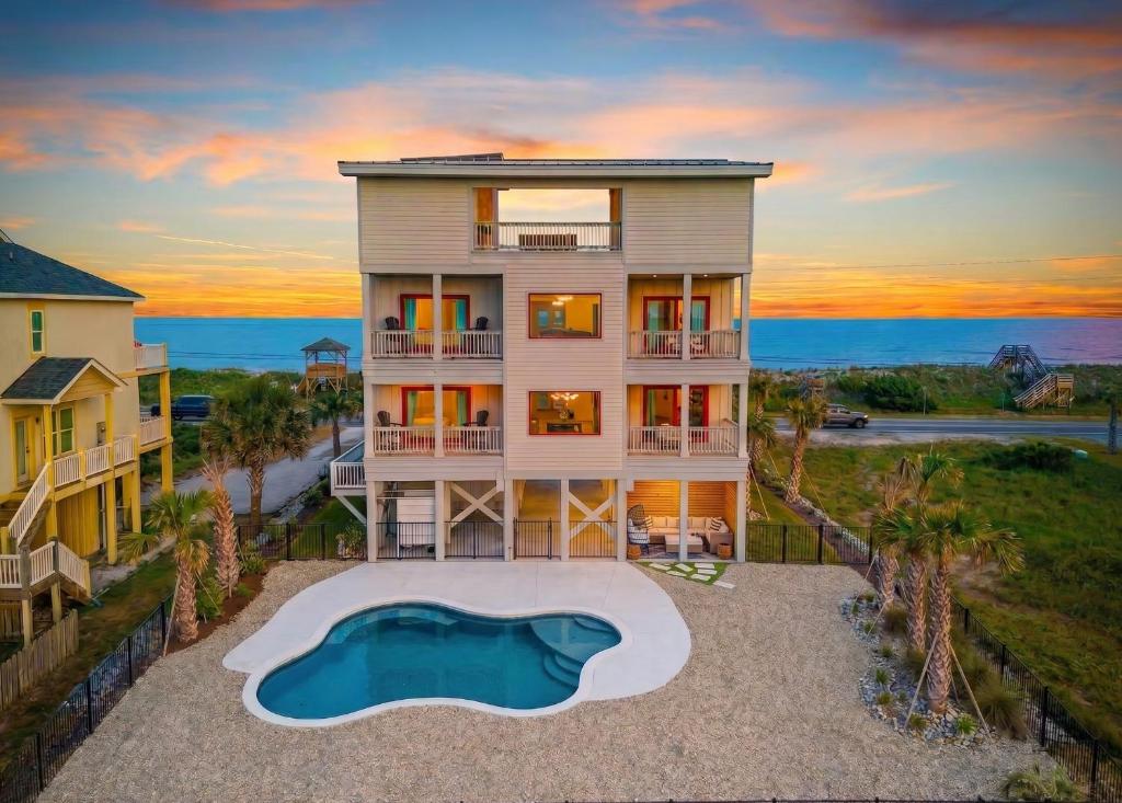 an aerial view of a house with a pool at North Topsail Beach - Beachfront, Pool & HotTub in North Topsail Beach