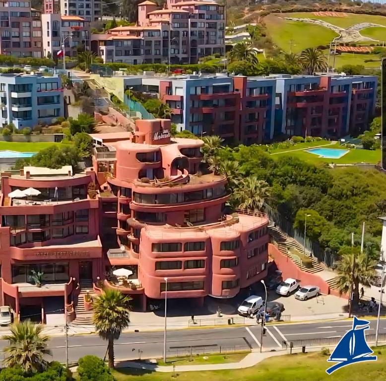 an aerial view of a city with buildings at Hotel Montecarlo Viña del Mar in Viña del Mar