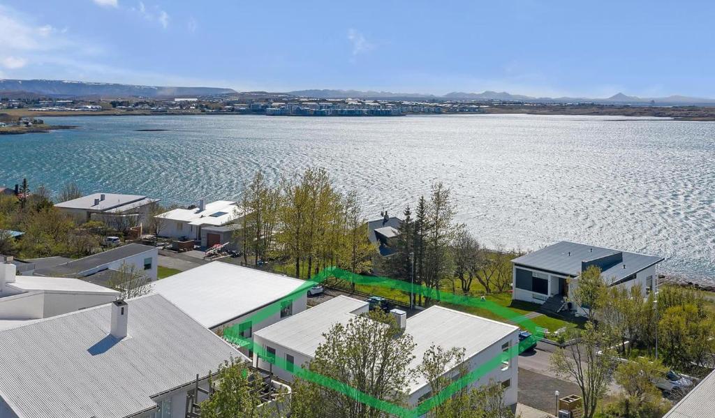 an aerial view of a large body of water at Ocean-Side Family Villa in Reykjavík