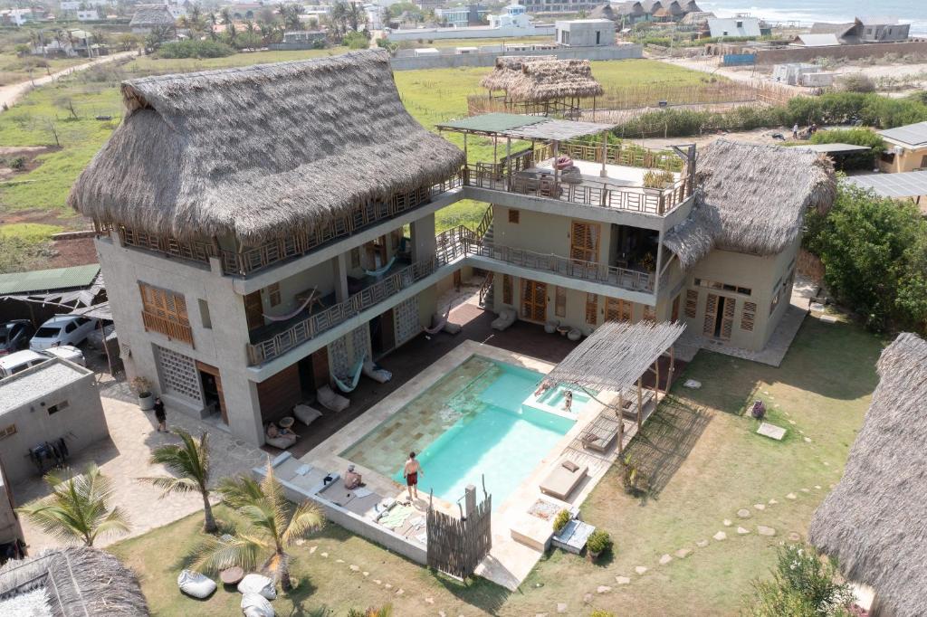 an aerial view of a house with a swimming pool at Casa Mambo Salinas in Santa Verónica