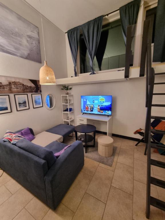 a living room with a couch and a tv at Nice appartment in city center Gol,free Wifi and electric in Gol