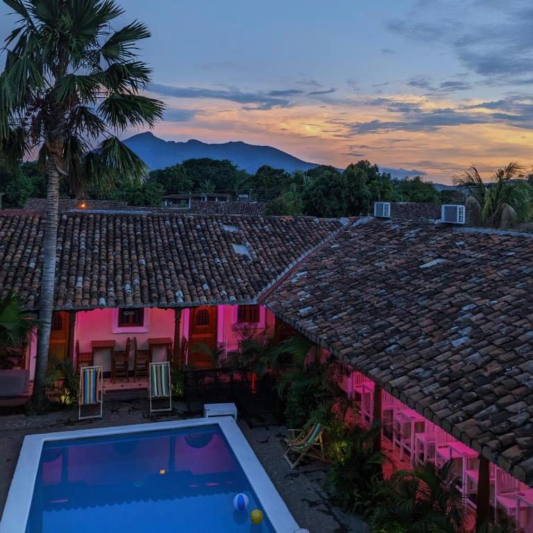 an aerial view of a house with a swimming pool at Japi - Encuentros in Granada