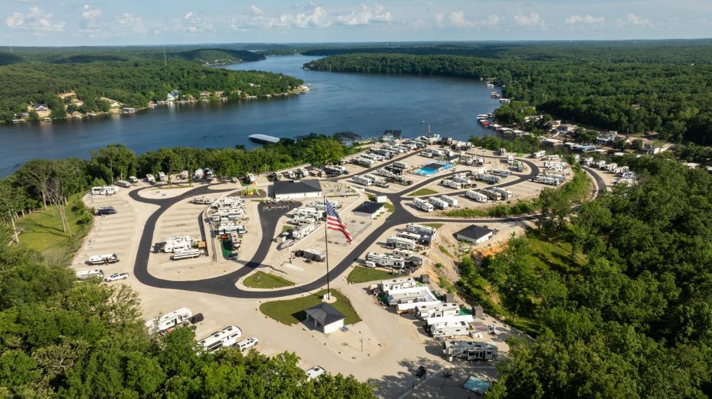an aerial view of a parking lot next to a river at Coconuts RV Resort in Gravois Mills