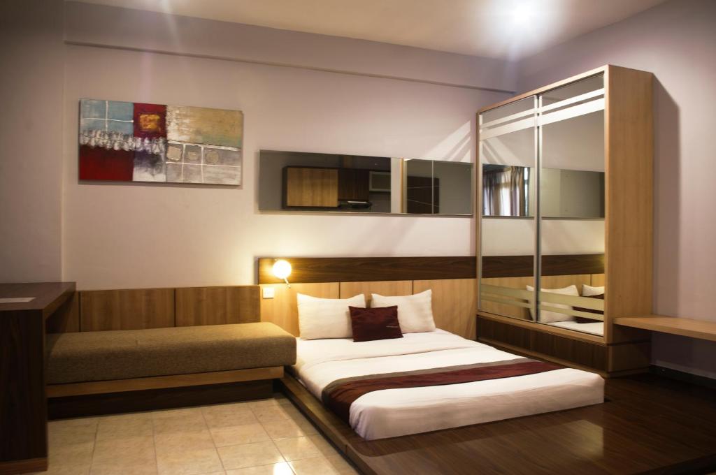 Postel nebo postele na pokoji v ubytování Valore Hotel