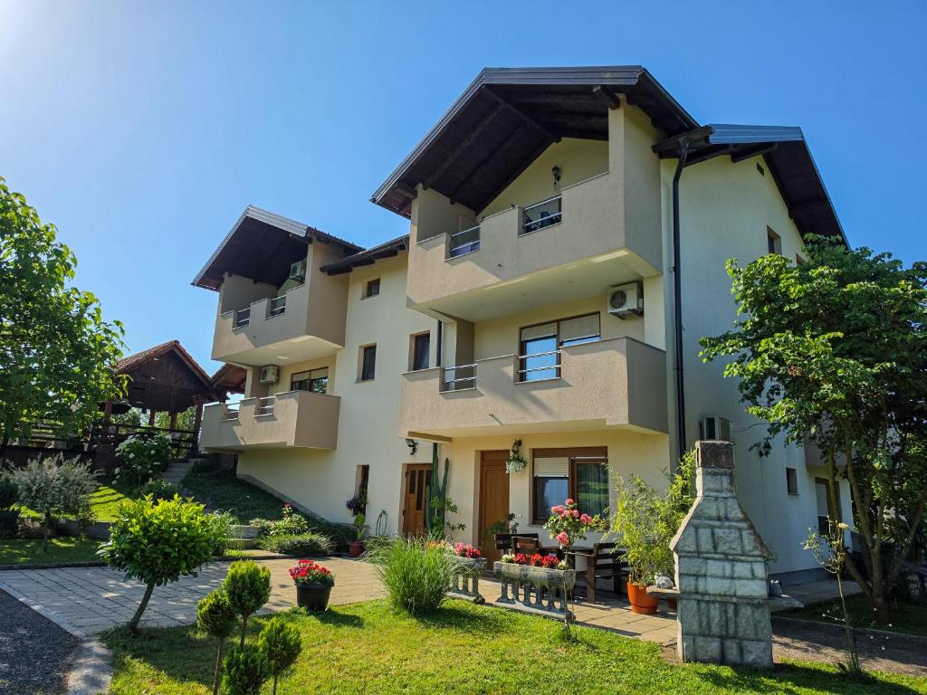 an exterior view of a house at Guest House Bunčić Rooms in Slunj