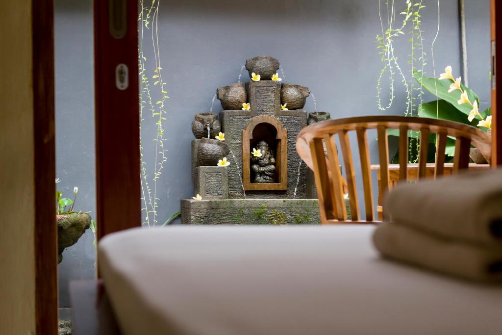 Postel nebo postele na pokoji v ubytování Baruna Guest House