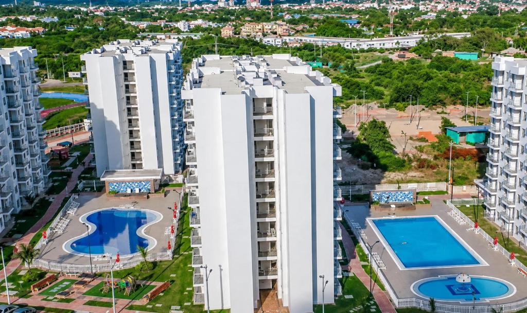 an aerial view of apartment buildings with a swimming pool at Apto Isabelu Girardot in Girardot
