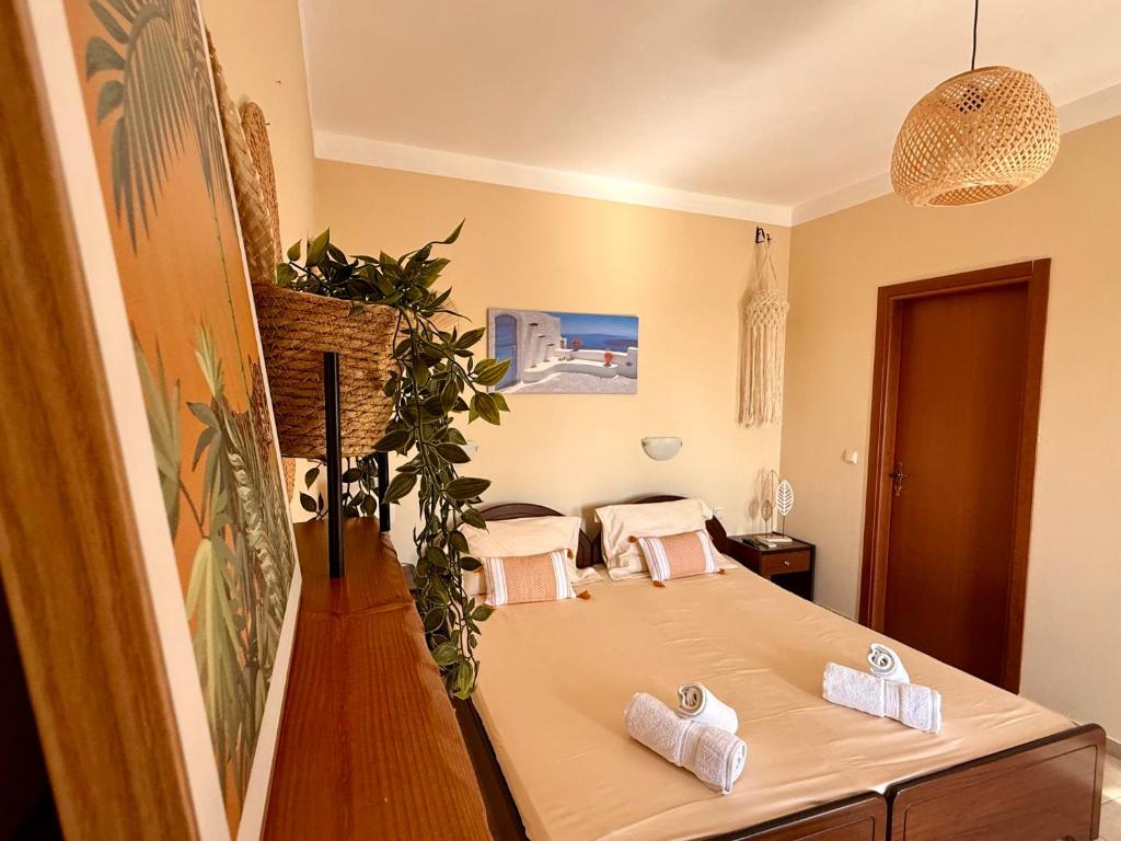 a room with a table with towels on it at Sun Thavma Living studio psiloritis in Lístaros