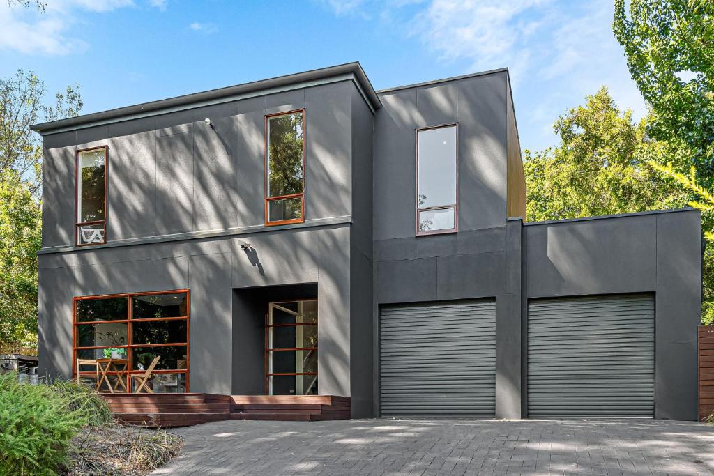 a modern house with a gray facade at Guest room in Stirling in Stirling