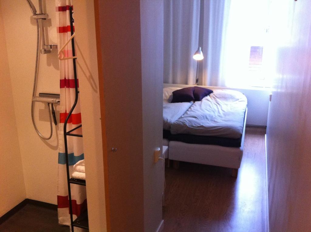 Postel nebo postele na pokoji v ubytování Trehörna Hotell & Konferens