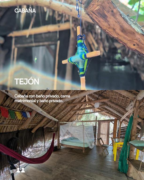 a toy airplane hanging from the ceiling of a room at Cabaña Tejon - Casa Corazon Mazunte in Mazunte
