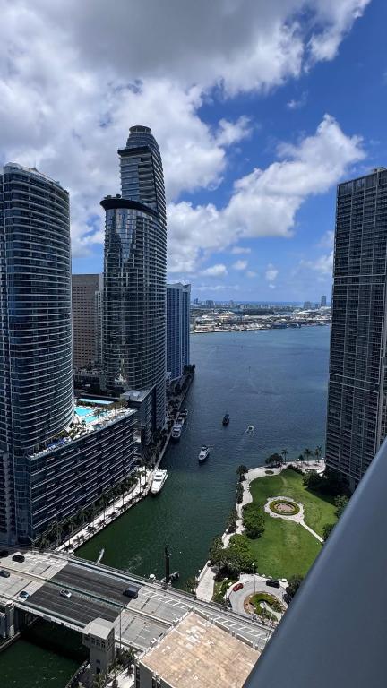 a view of a city with tall buildings and a river at Viceroy Residences in Miami
