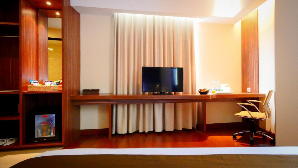 TV a/nebo společenská místnost v ubytování PRIME PARK Hotel & Convention Pekanbaru