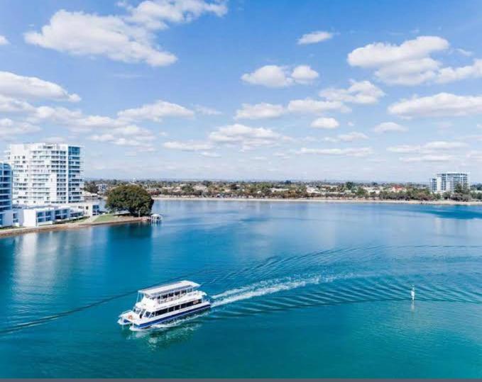 a boat in a large body of water at Budget Friendly Accommodation in Mandurah