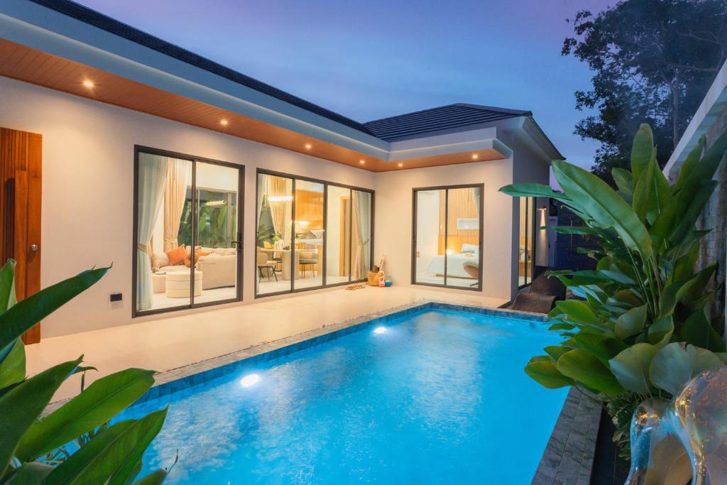an image of a swimming pool in a house at Luxury B Baya Pool Villa in Ban Chong Phli