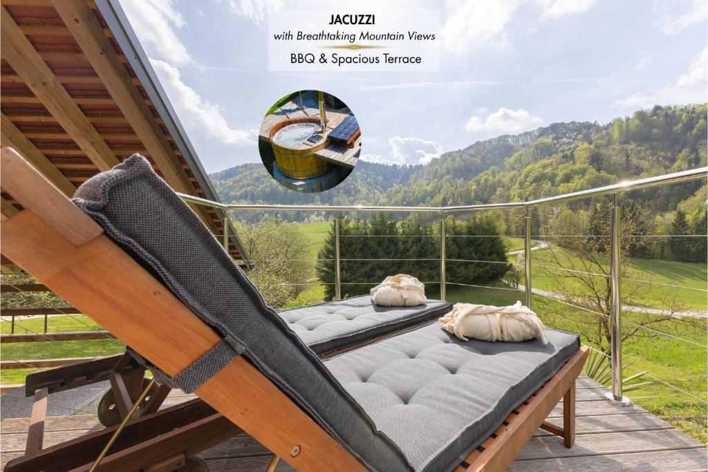 a bed on a balcony with a view of a mountain at Herbal Garden Resort Plahtica in Jurklošter