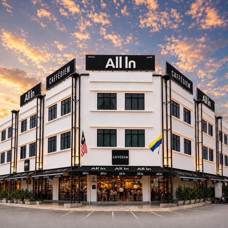 a large white building with an all hotel at ALL IN HOTEL in Kangar