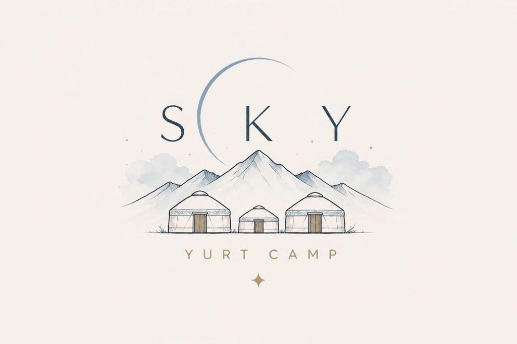 a sketch of aominium building and a mountain at Sky yurt camp in Këk-Say