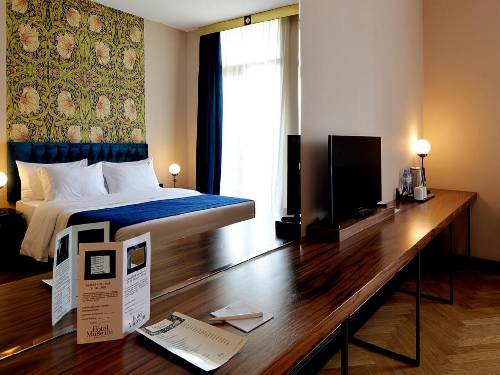 TV a/nebo společenská místnost v ubytování Museum Hotel