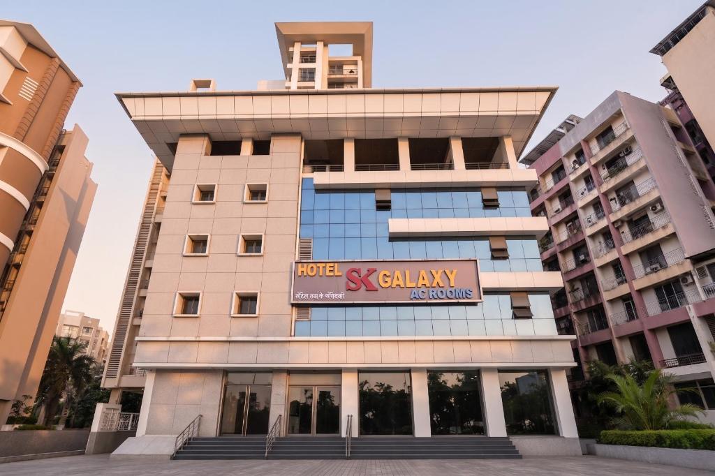 a building with a sign that reads hotel sky gallery at FabHotel SK Galaxy in Thane