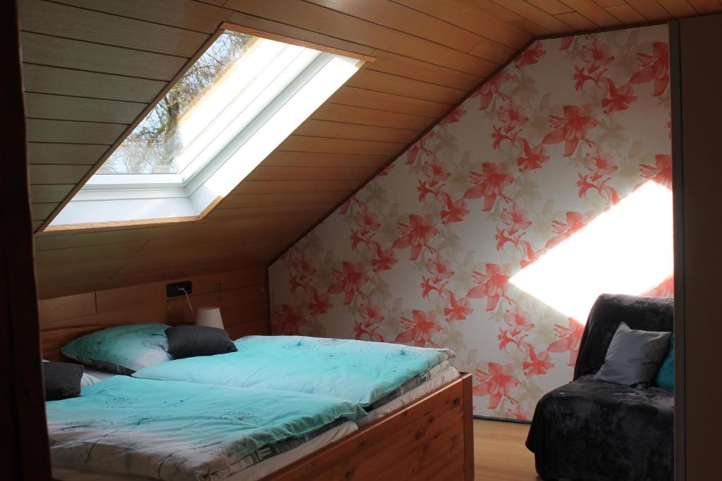 Postel nebo postele na pokoji v ubytování Ferienwohnung Sonnengruss