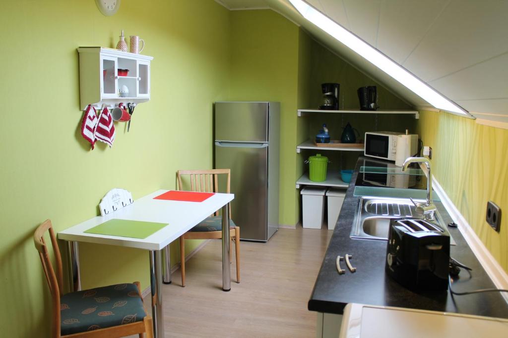 Kuchyň nebo kuchyňský kout v ubytování Ferienwohnung Sonnengruss