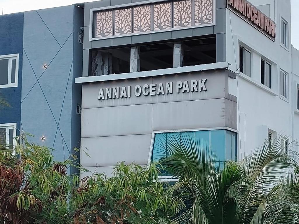 an animal organ park sign on the side of a building at Annai Ocean Park in Velankanni
