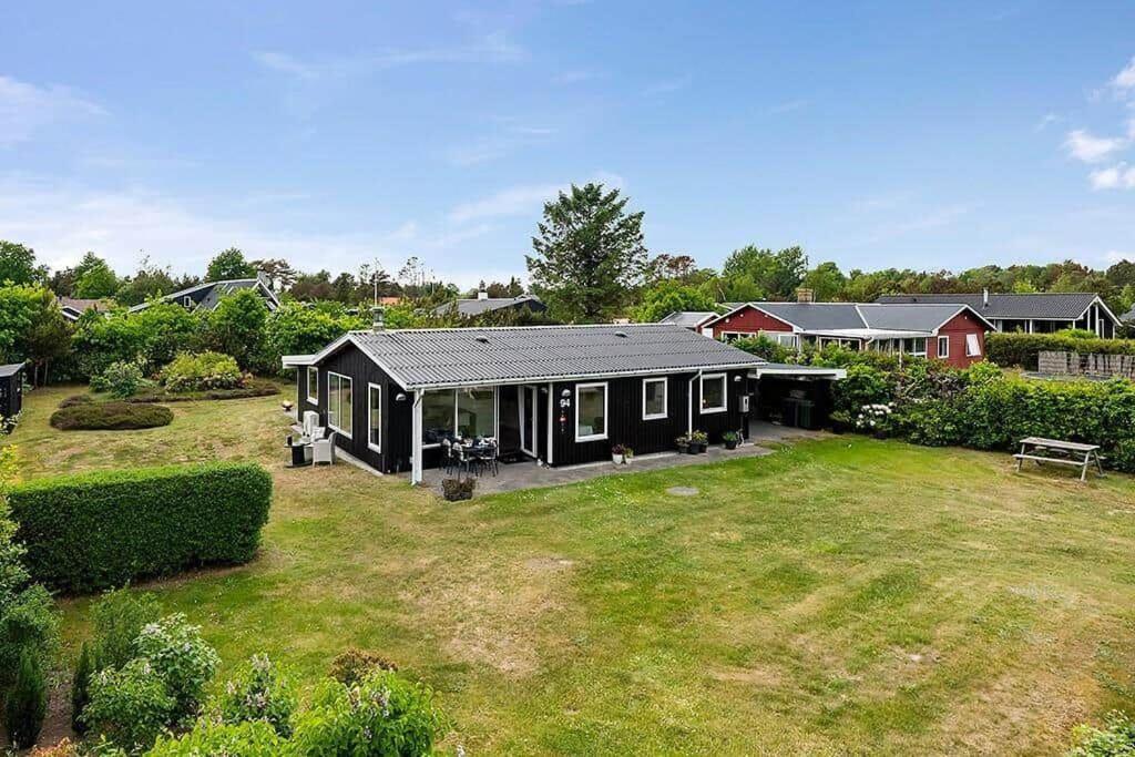a home with a large yard with a house at OH412-Hadsund-Halvrebene-94 in Hadsund