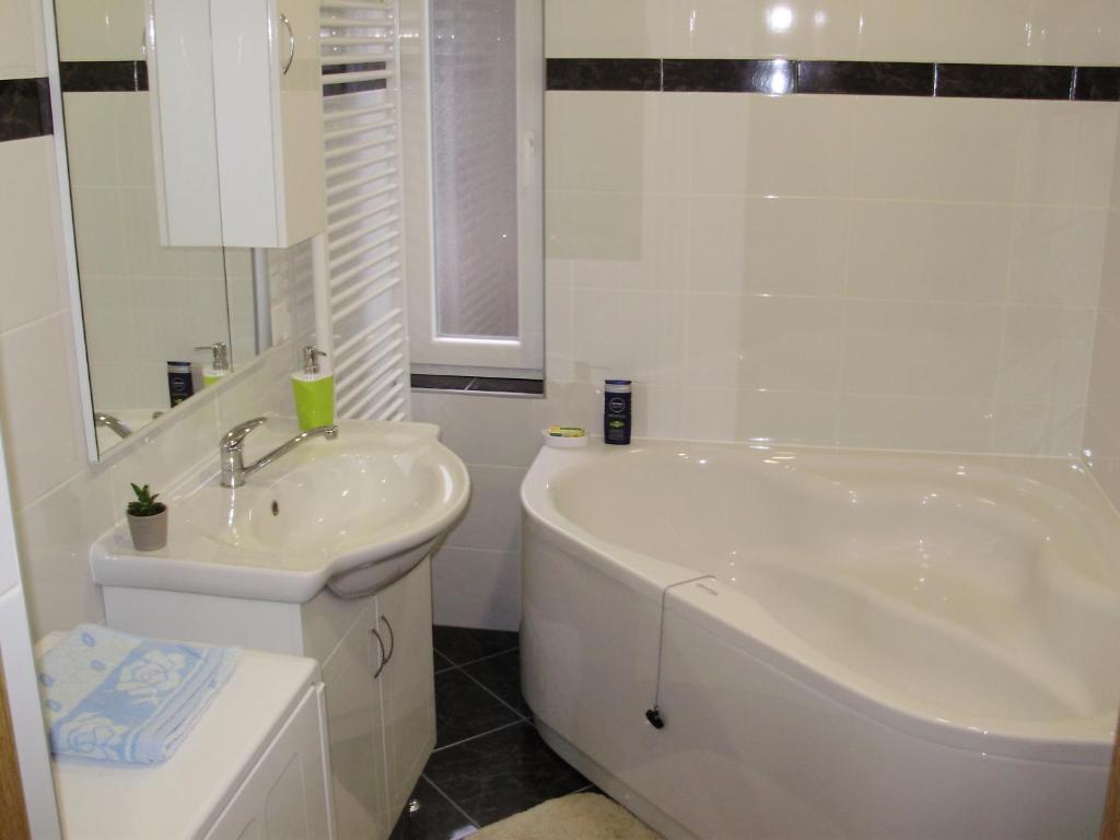Kúpeľňa v ubytovaní Apartment Maximilian-free parking!!!