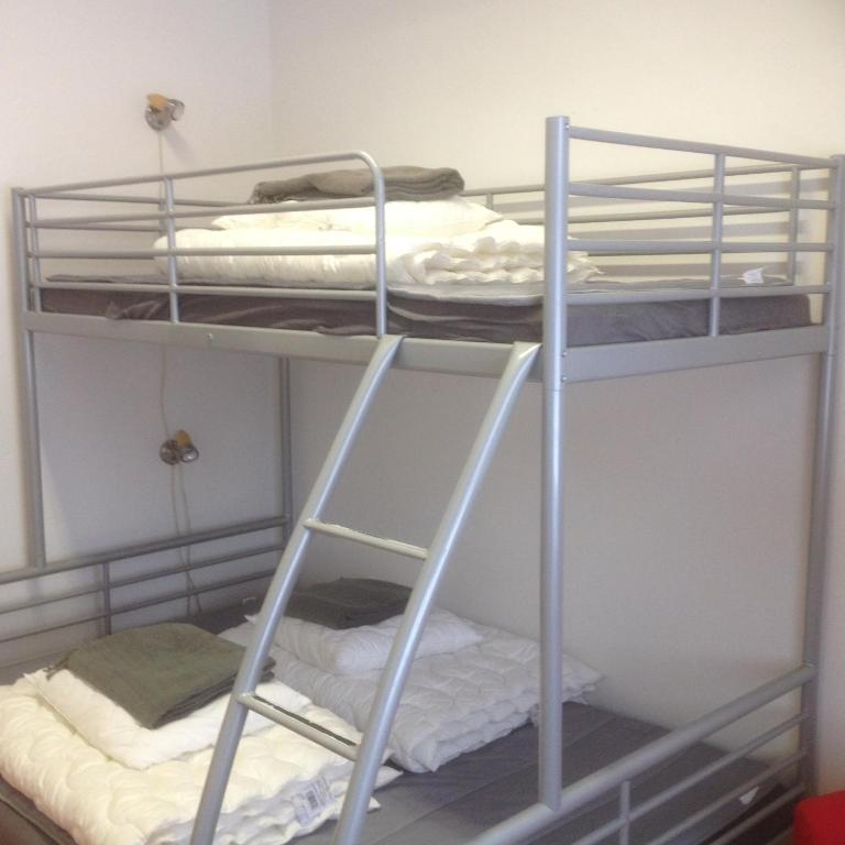 Postel nebo postele na pokoji v ubytování Gafsele Lappland Hostel