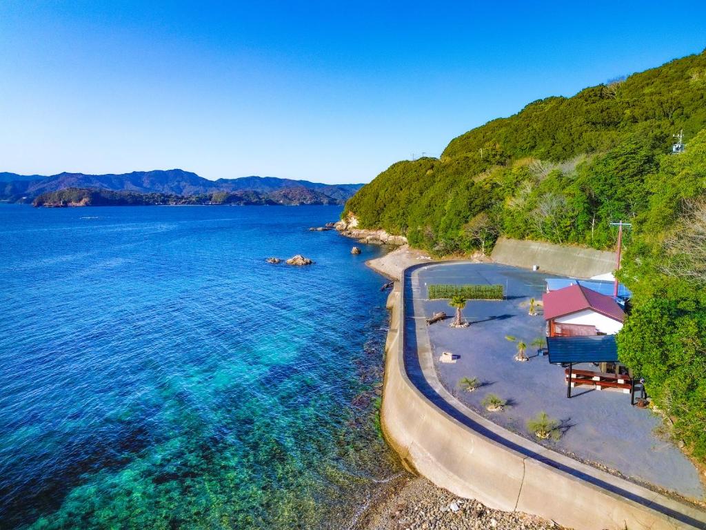 an aerial view of a beach with the ocean at 2four Villa Costa in Minamiise
