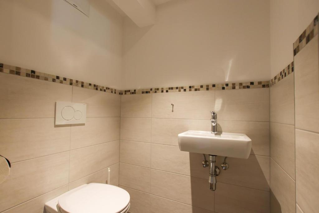Koupelna v ubytování Hotel - Wirts'haus "Zum Schweizer"