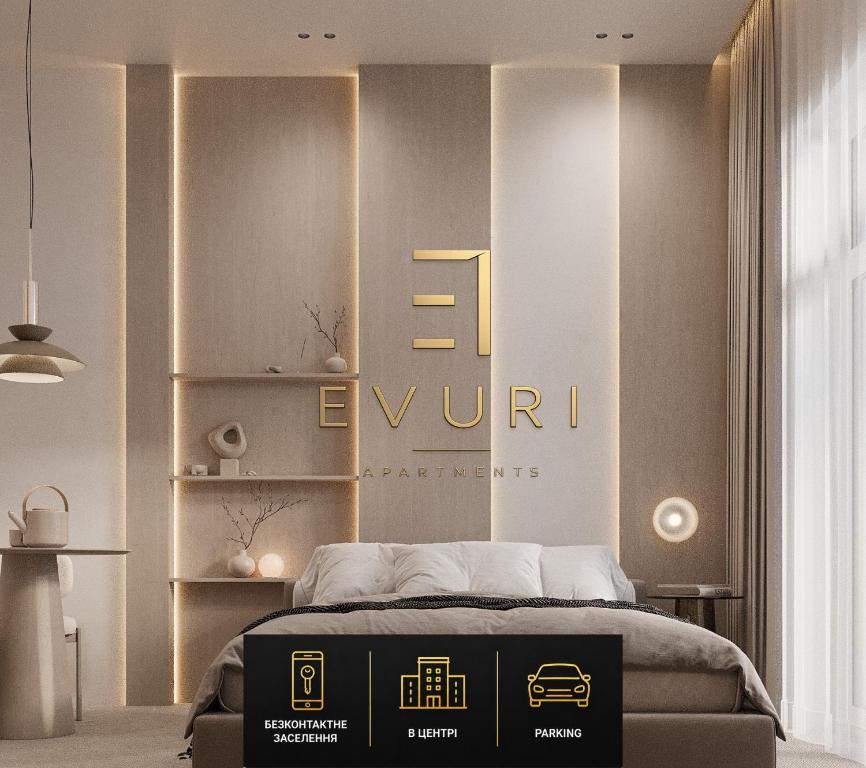 a bedroom with a bed with a sign on the wall at EVURI Apartments BUDAPEST 2 in Uzhhorod