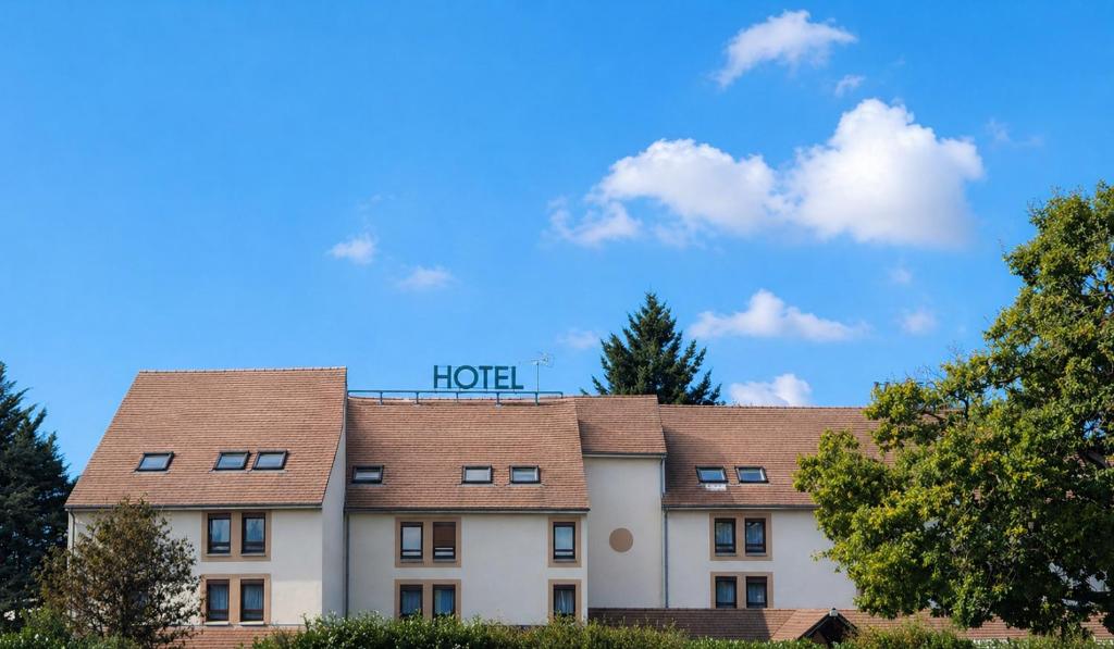a hotel building with the words hotel on top of it at Hôtel Ikar Blois Sud in Saint-Gervais-la-Forêt