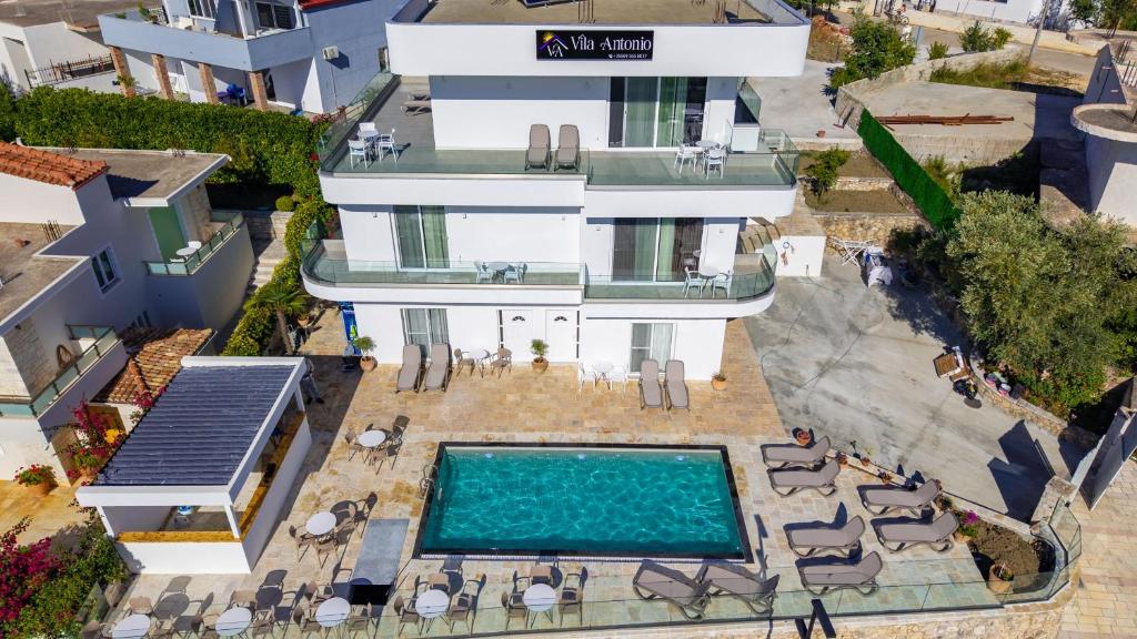 an aerial view of a house with a swimming pool at Vila Antonio in Ksamil