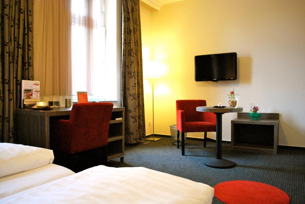 TV a/nebo společenská místnost v ubytování Hotel Dietrichsdorfer Hof